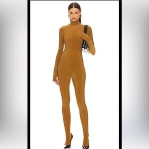 NWT Norma Kamali
Slim Fit Turtle Catsuit With Footsie size S